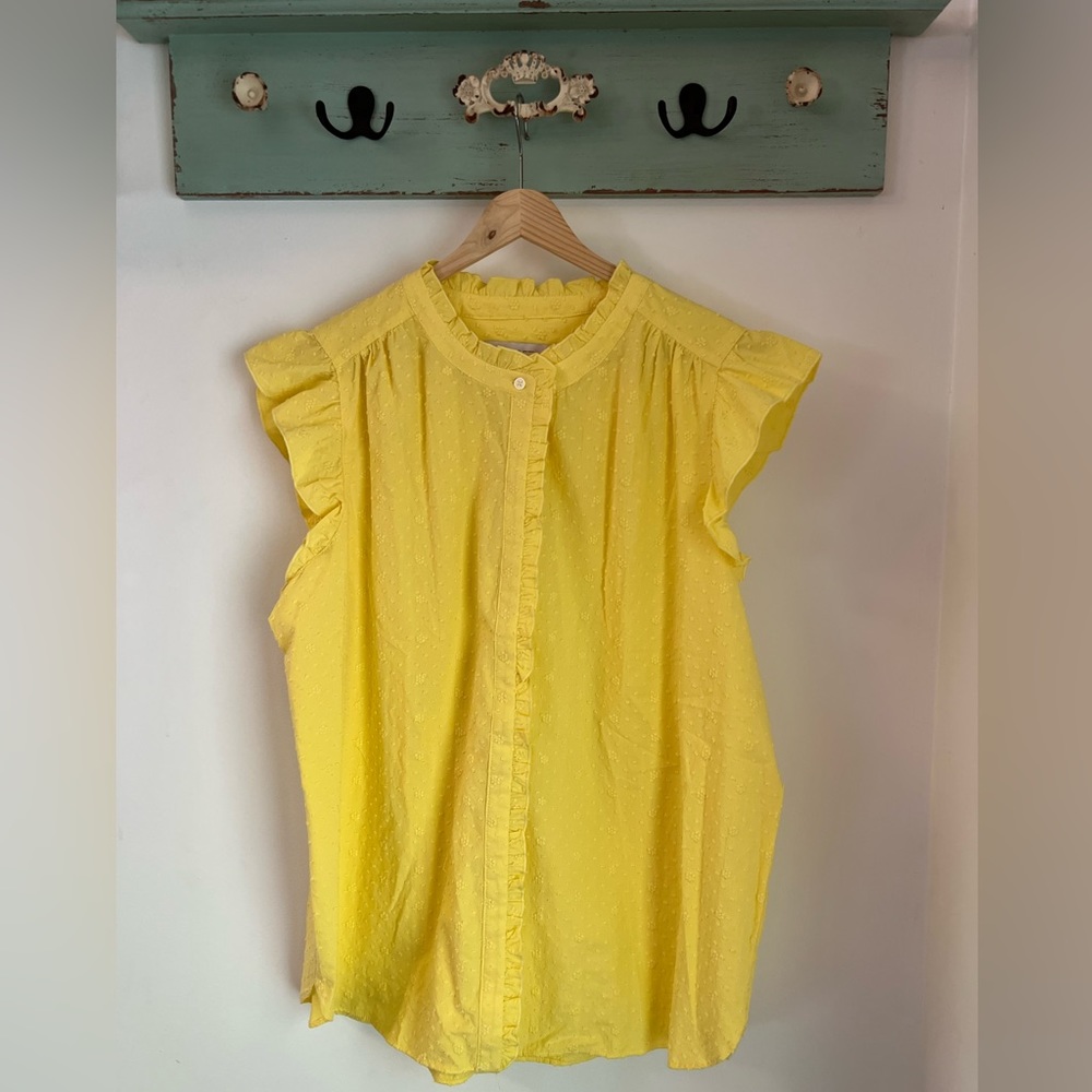 Yellow, flutter-sleeve blouse with floral embroidered details.